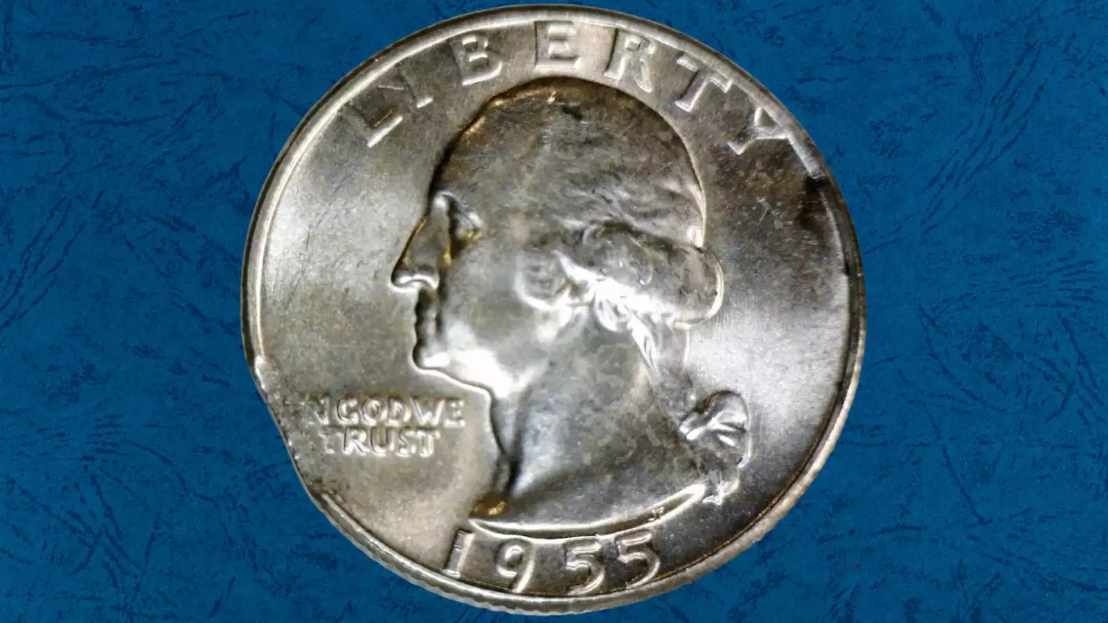 1955 Washington quarter clipped planchet error showing curved section missing from the coin edge